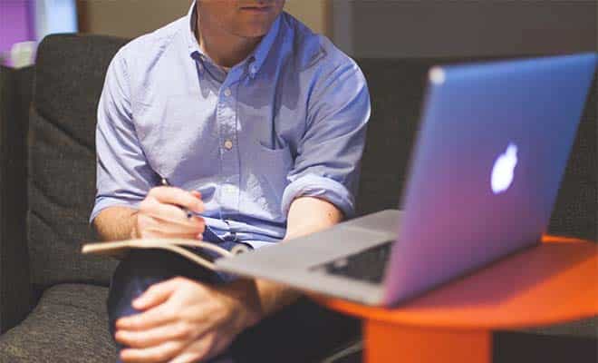 A photo of a gay man working.