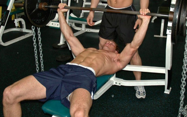 This is a photo of two guys at the gym.