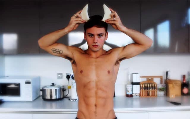 This is a photo of Tom Daley wearing bread horns.