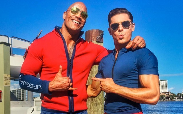 This is a photo of Zac Efron and The Rock.