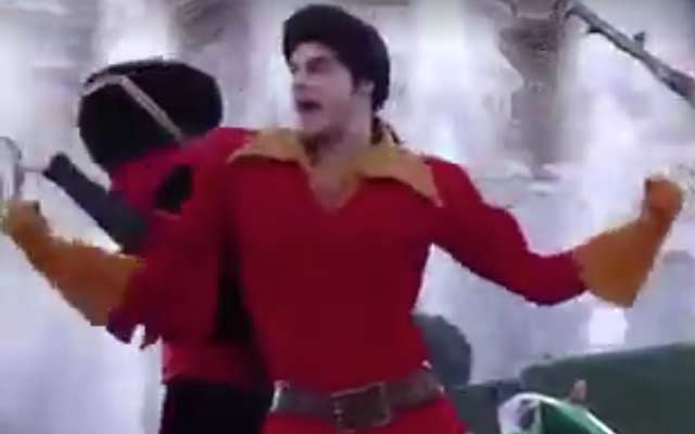 This is a photo of Gaston dancing in a Disney theme park.