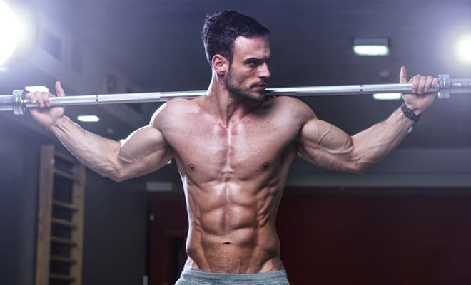 Hot guy working out at the gym