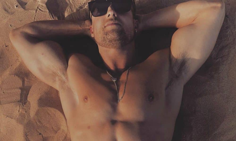 Simon Sherry-Wood Lays out at Beach