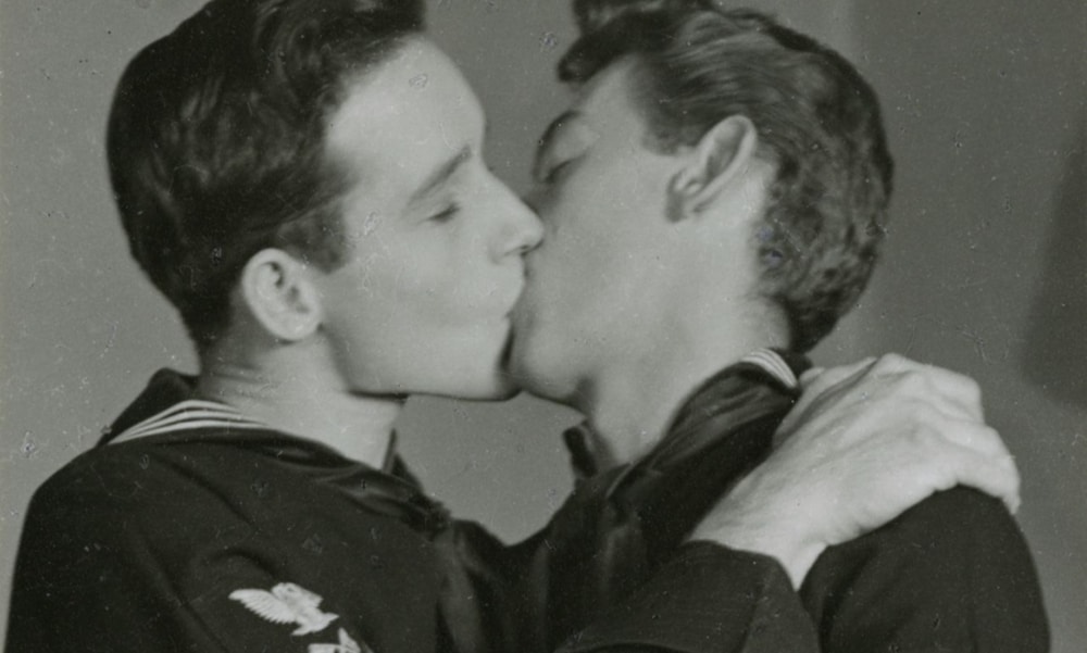 Vintage photo of a gay couple kissing