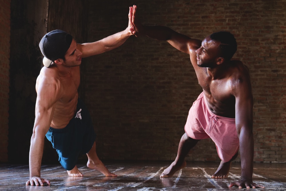 Two men working out and burning fat