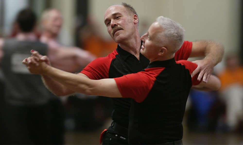 Paul van Houten and partner Gary Dougan in action during the Mens graded Modern Dancing competition