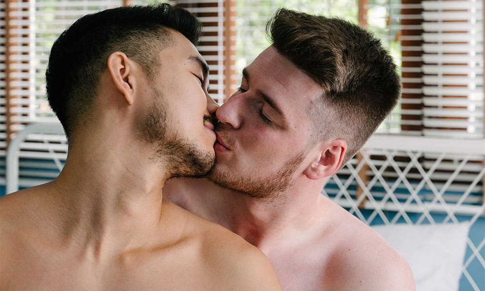 Two Topless Gay Men Kissing