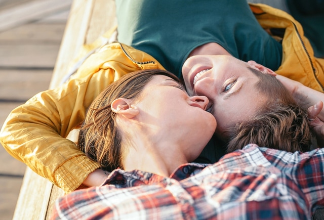 couple on a bench affectionate