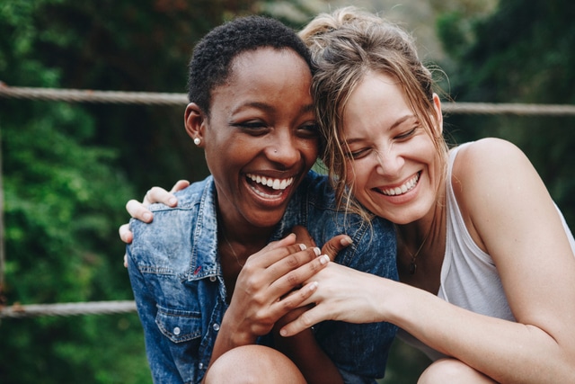 women holding hands