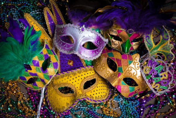 A group of venetian, mardi gras mask or disguise on a dark background