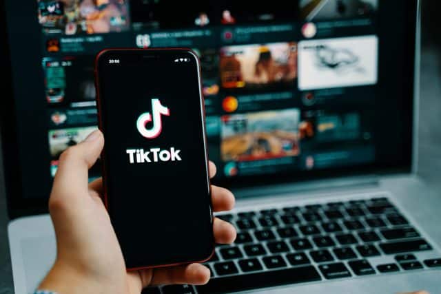 TikTok application icon on iPhone screen.