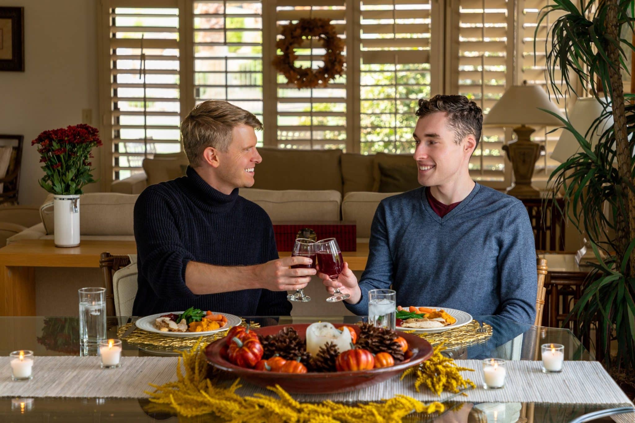 Gay couple eat thanksgiving dinner