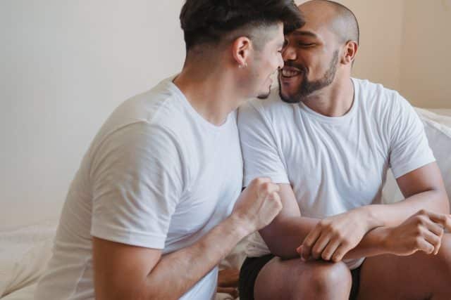 Gay couple kissing