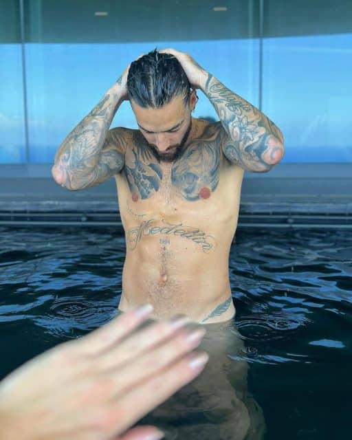 Maluma Flaunts His Toned Physique in Revealing Pool Photos