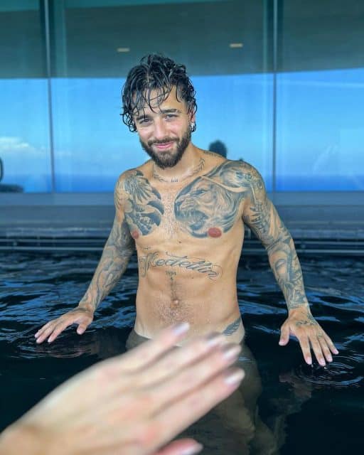 Maluma Flaunts His Toned Physique in Revealing Pool Photos