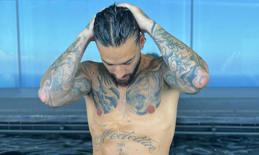 Maluma Flaunts His Toned Physique in Revealing Pool Photos