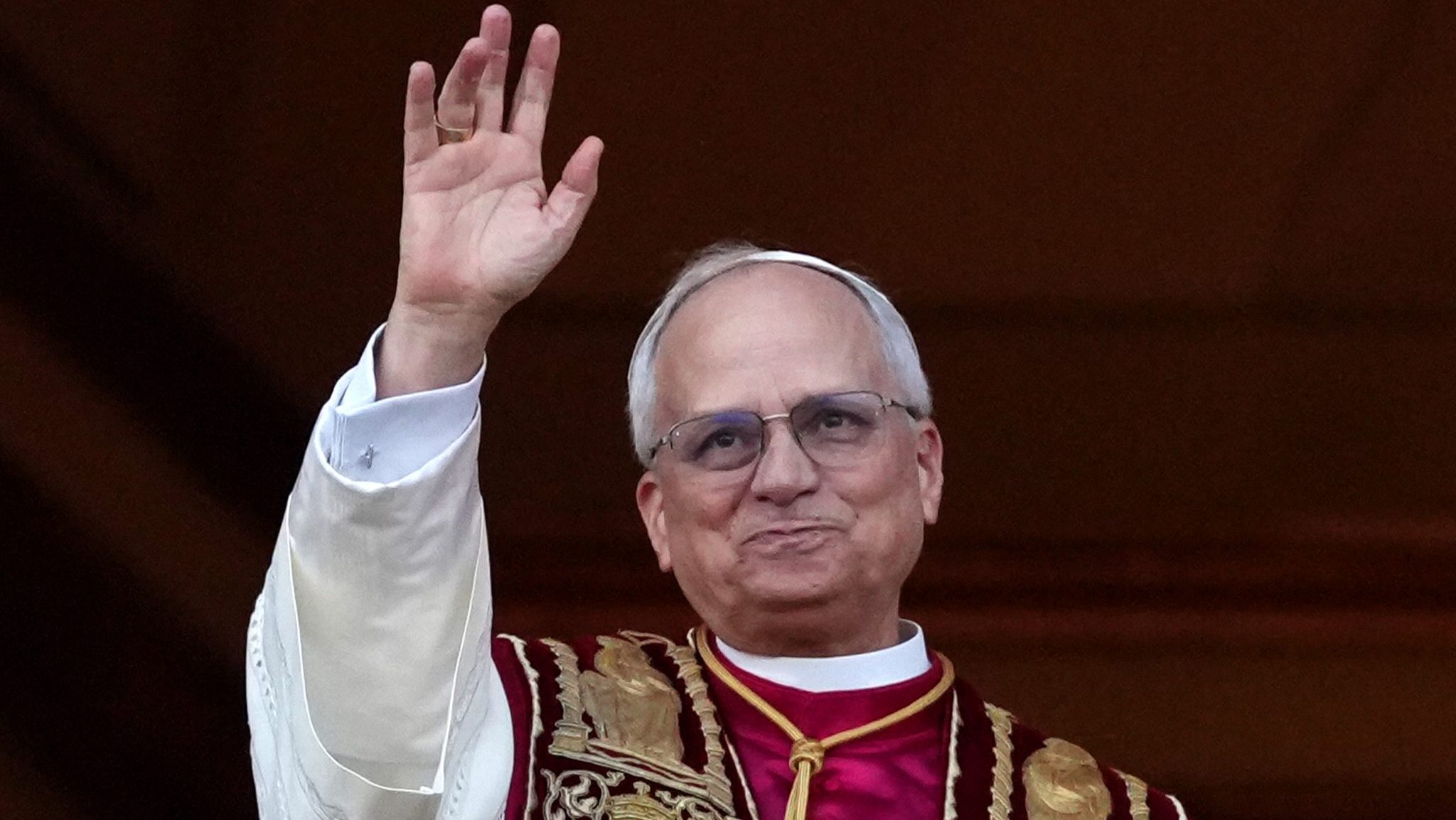 The newly elected Pontiff, Pope Leo XIV is seen for the first time from the Vatican balcony on May 8, 2025 in Vatican City, Vatican. White smoke was seen over the Vatican early this evening as the Conclave of Cardinals took just two days to elect Cardinal Robert Francis Prevost, who will be known as Pope Leo (Leone) XIV, as the 267th Supreme Pontiff after the death of Pope Francis on Easter Monday. (Photo by Christopher Furlong/Getty Images)