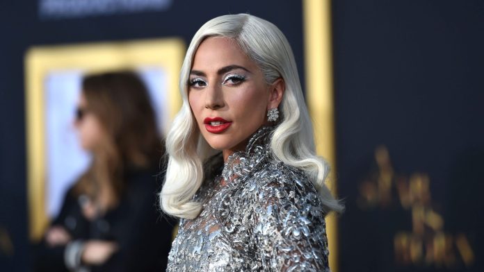 Lady-Gaga-Big-Mouth Lady Gaga arrives at the Premiere Of Warner Bros. Pictures' 'A Star Is Born' at The Shrine Auditorium on September 24, 2018 in Los Angeles, California. (Photo by Neilson Barnard/Getty Images)