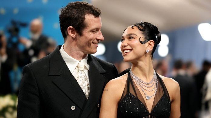 Callum Turner and Dua Lipa attend the 2025 Met Gala Celebrating "Superfine: Tailoring Black Style" at Metropolitan Museum of Art on May 05, 2025 in New York City.