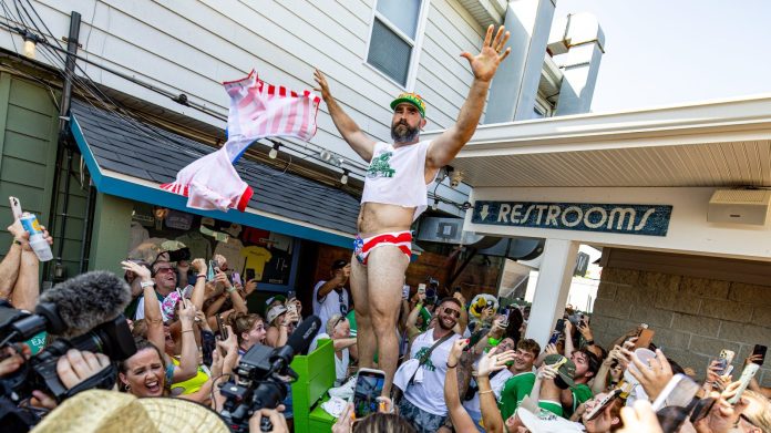 Jason Kelce pulling off his shorts