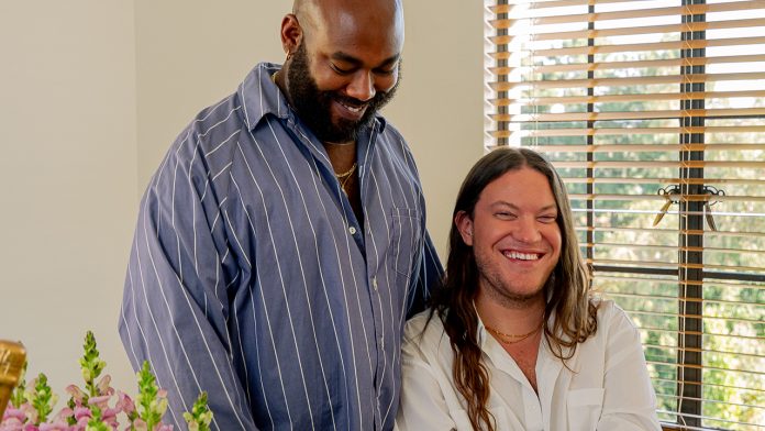 Darnell Lamont and Chris Hill pictured on their intimate wedding day