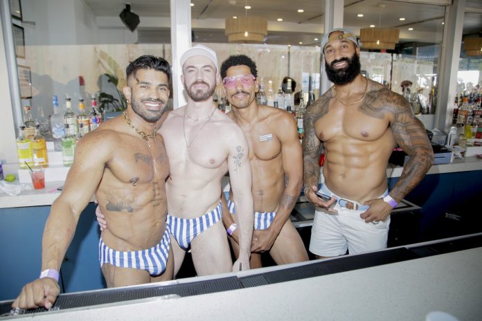 Tryst Hospitality Celebrates The 50th Invasion of Fire Island Pines Bartenders at The Blue Whale attend as Tryst Hospitality celebrates the 50th Invasion of Fire Island Pines on July 04, 2025 in Sayville, New York. (Photo by Santiago Felipe/Getty Images for Tryst Hospitality)