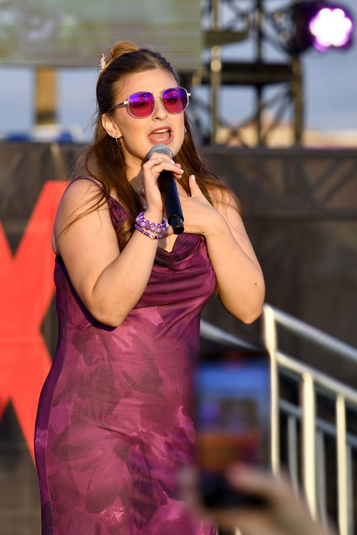 SANTA MONICA, CALIFORNIA - JULY 17: Abbey Romeo performs onstage during Netflix Summer Break at Santa Monica Pier on July 17, 2025 in Santa Monica, California. (Photo by Jerod Harris/Getty Images for Netflix)