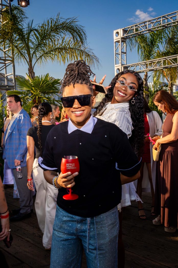 SANTA MONICA, CALIFORNIA - JULY 17: (L-R) AJ Blount and Britney Thompson attend Netflix Summer Break at Santa Monica Pier on July 17, 2025 in Santa Monica, California. (Photo by Roger Kisby/Getty Images for Netflix)