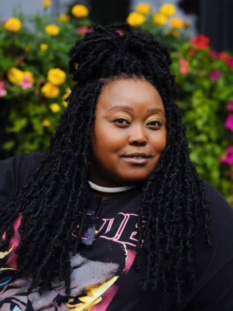 'Wednesday' star Luyanda Unati Lewis-Nyawo opens up about Sheriff Santiago, queer visibility, drag, and her love of horror, anime, and Garlic Bread the cat.