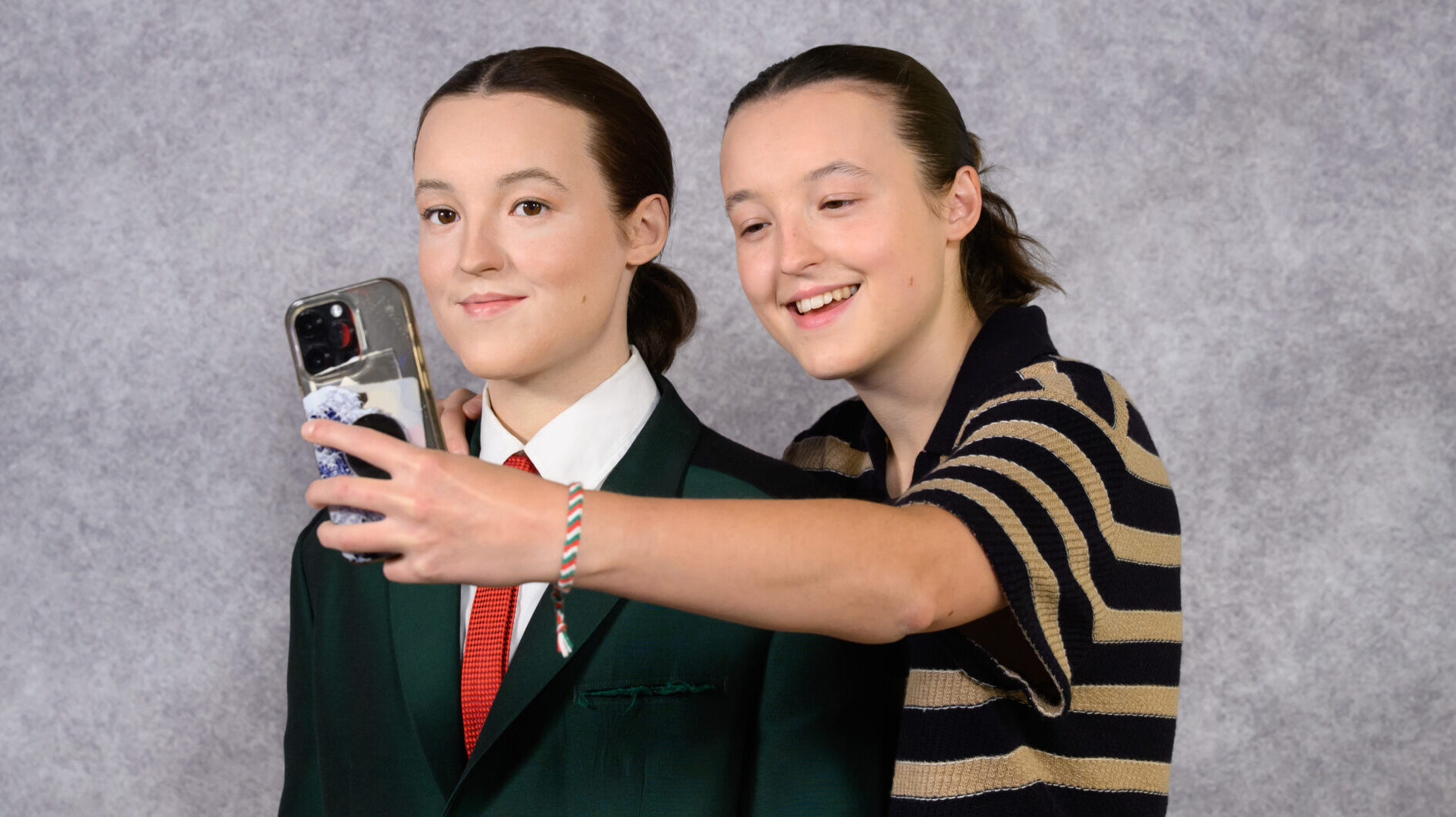 Bella Ramsey meets their wax figure at Madame Tussuads. Photo: Merlin Entertainment
