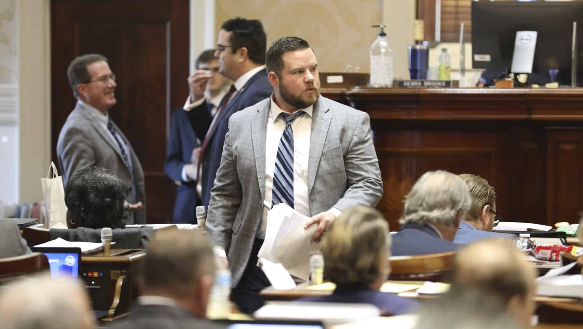 South Carolina Rep. RJ May, R-West Columbia, walks down the aisle of the House on Tuesday, March 14, 2023, in Columbia, South Carolina.