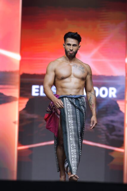 The men of Mister Global 2025 walk the stage in traditional Thai attire.
