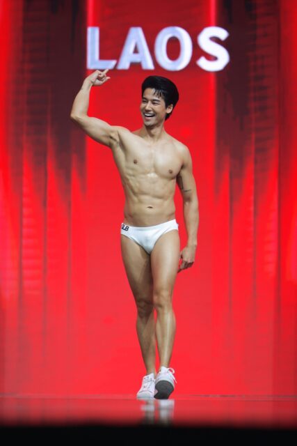 The men of Mister Global 2025 walk the stage for the swimsuit category in Thailand.