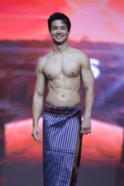 The men of Mister Global 2025 walk the stage in traditional Thai attire.
