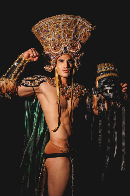 The men of Mister Global 2025 dressed in costume celebrating their unique cultural heritage.