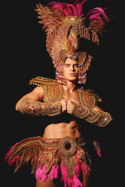 The men of Mister Global 2025 dressed in costume celebrating their unique cultural heritage.