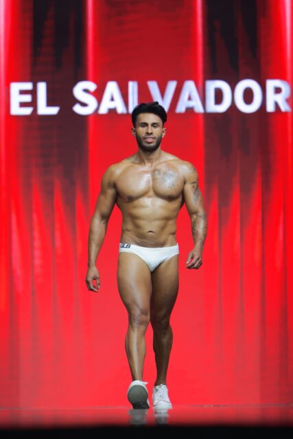 The men of Mister Global 2025 walk the stage for the swimsuit category in Thailand.