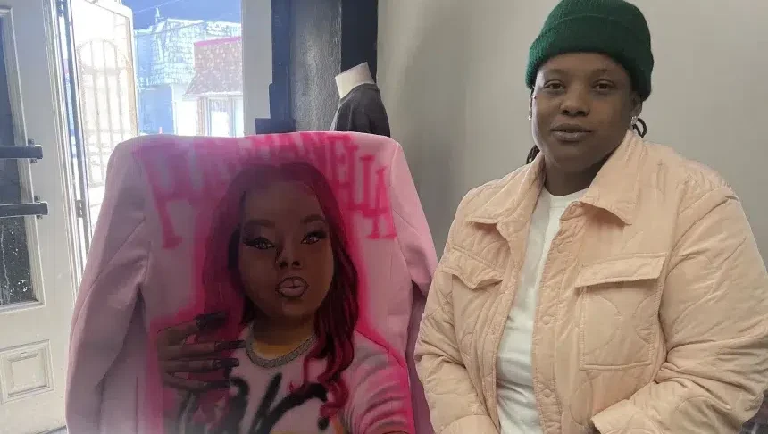 Patricia Bender pictured with a custom airbrushed jacket of Tahiry Broom in Cleveland, Ohio, on Feb 21, 2025. Courtesy Patricia Bender
