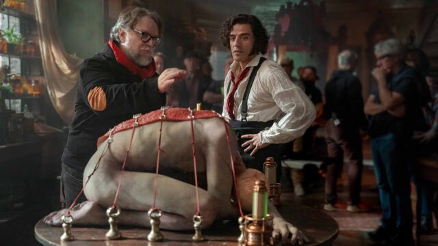 FRANKENSTEIN. - BTS - (L to R) Director Guillermo del Toro and Oscar Issac as Victor Frankenstein on the set of Frankenstein. Cr. Ken Woroner/Netflix © 2025.