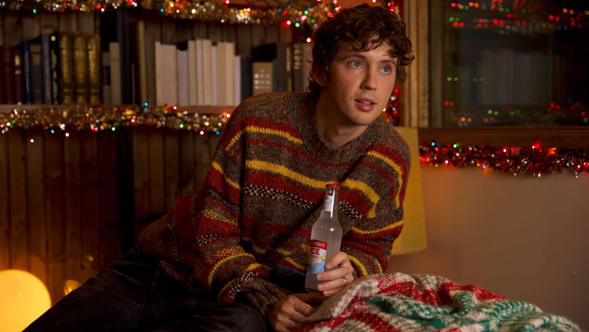 Troye Sivan joins Smirnoff ICE for a playful holiday series, gift boxes, pop-ups, and festive surprises nationwide.