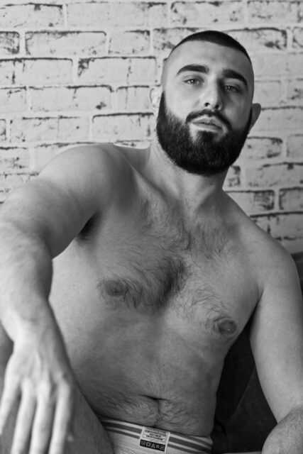 Filmmaker and Egyptologist Curtis Woodside opens up about body confidence, vulnerability, and reclaiming self-expression through a nude shoot in Milan.