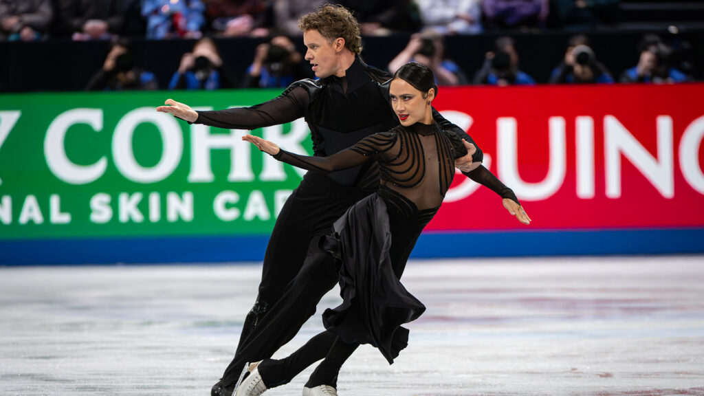 Glitter & Gold: Ice Dancing. (L to R) Evan Bates and Madison Chock at the ISU Grand Prix in Nagoya Japan. Cr. Alan Clarke/Netflix © 2026