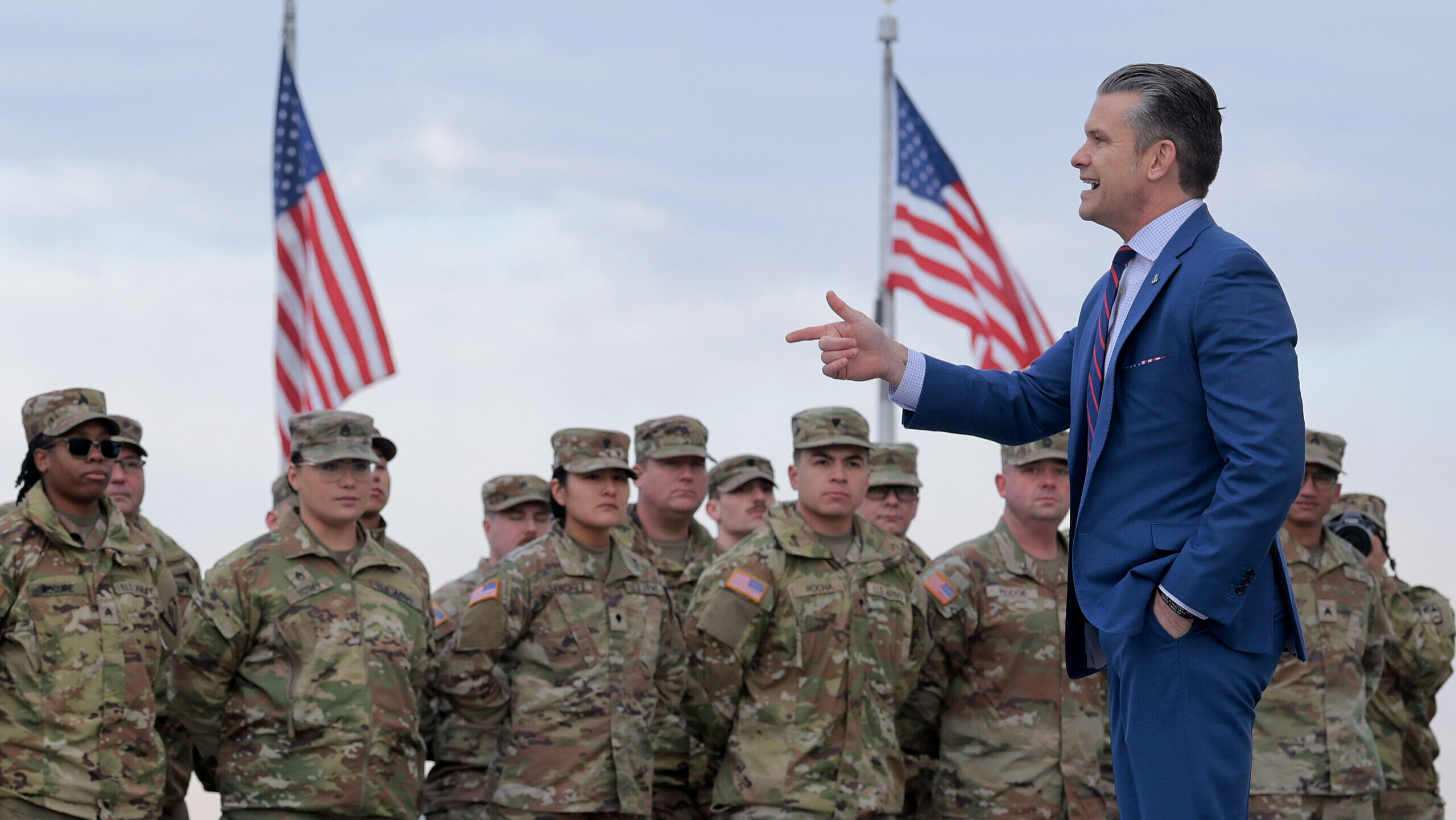 U.S. Secretary of War Pete Hegseth address a group of National Guard troops before administering their re-enlistment ceremony at the base of the Washington Monument on February 06, 2026 in Washington, DC. Braving sub-freezing temperatures, Hegseth led a re-enlistment ceremony for 105 National Guard troops from Alabama, Arkansas, Florida, Indiana, Mississippi, Ohio, Oklahoma, South Carolina and West Virginia on the National Mall.
