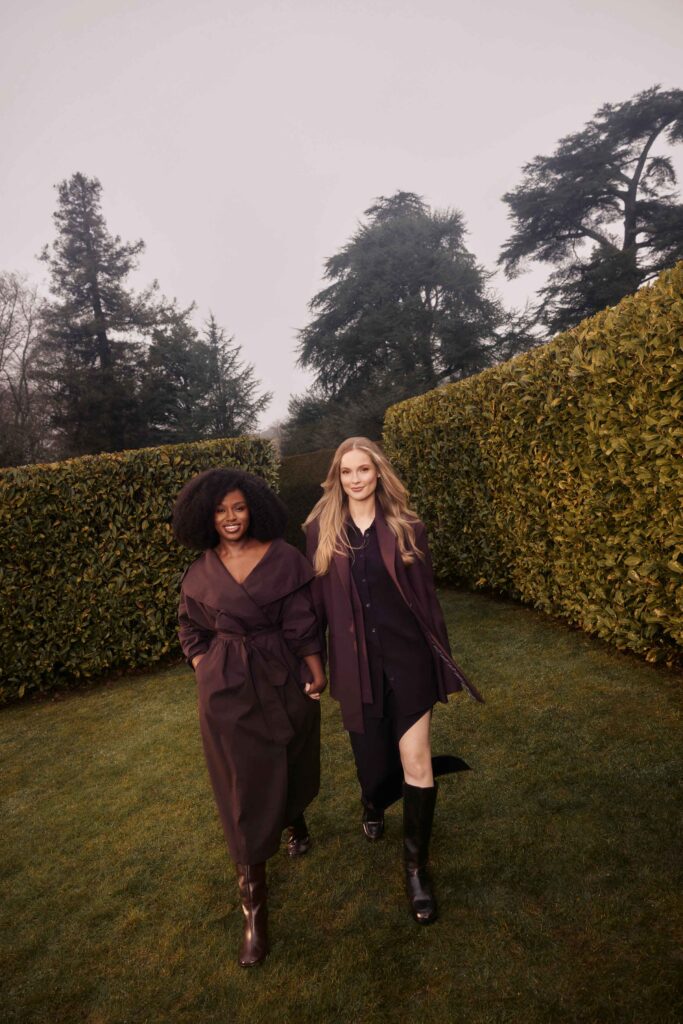 Bridgerton Season 5. Masali Baduza as Michaela Stirling. Hannah Dodd as Francesca Stirling. Photo by Zoe McConnell.