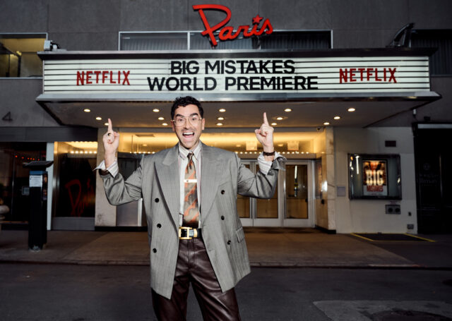 Dan Levy poses in front of the marquee during the NYC Premiere Screening and Party for BIG MISTAKES on April 06, 2026 in New York City. 