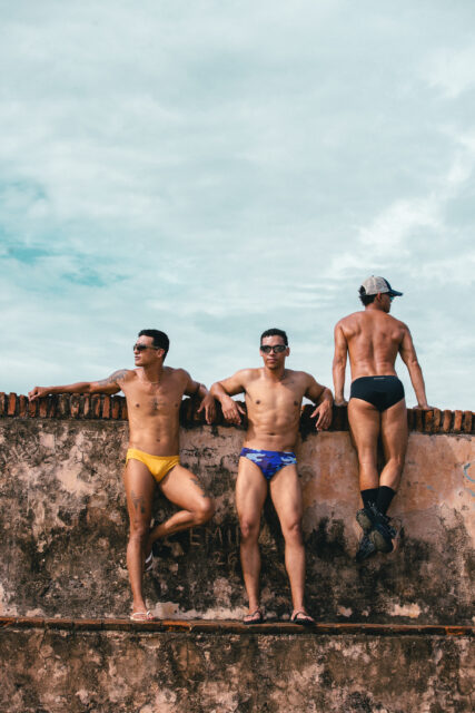 Sniffies launched a new Summer Swim Collection featuring swim briefs, crop tanks, trunks, and towels inspired by spontaneous hookups and beach days.
