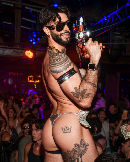 Oly Innes celebrated his birthday with a sunglasses-themed bash at The Abbey featuring Erika Jayne as DJ, go-go dancers, and a packed West Hollywood crowd.