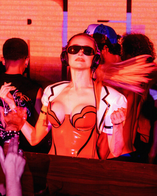 Oly Innes celebrated his birthday with a sunglasses-themed bash at The Abbey featuring Erika Jayne as DJ, go-go dancers, and a packed West Hollywood crowd.