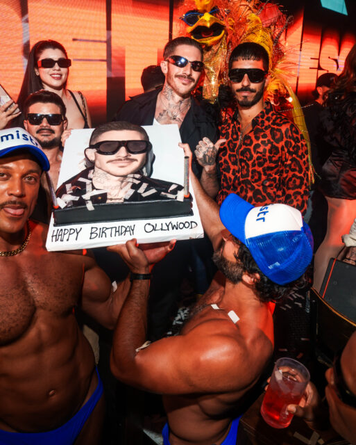 Oly Innes celebrated his birthday with a sunglasses-themed bash at The Abbey featuring Erika Jayne as DJ, go-go dancers, and a packed West Hollywood crowd.