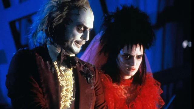 Michael Keaton and Winona Ryder in Beetlejuice (1999). Photo: Warner Bros.